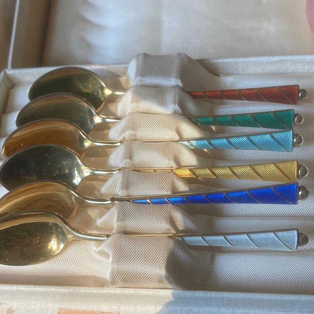 Set of six demitasse Sterling and enamel spoons